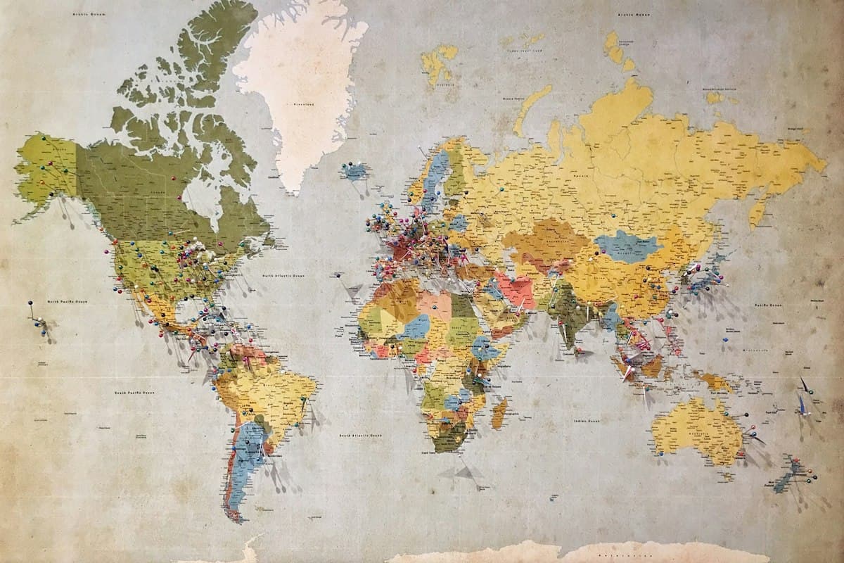 Folded paper map with routes and pins